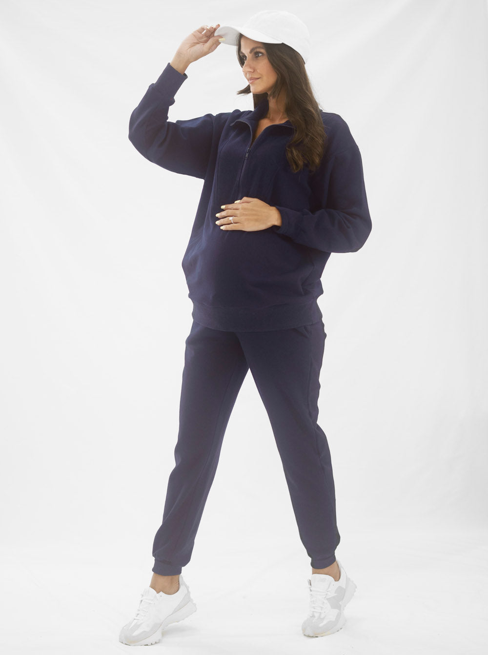 A woman in Calla navy black maternity tracksuit set, front3 (6647093657703)