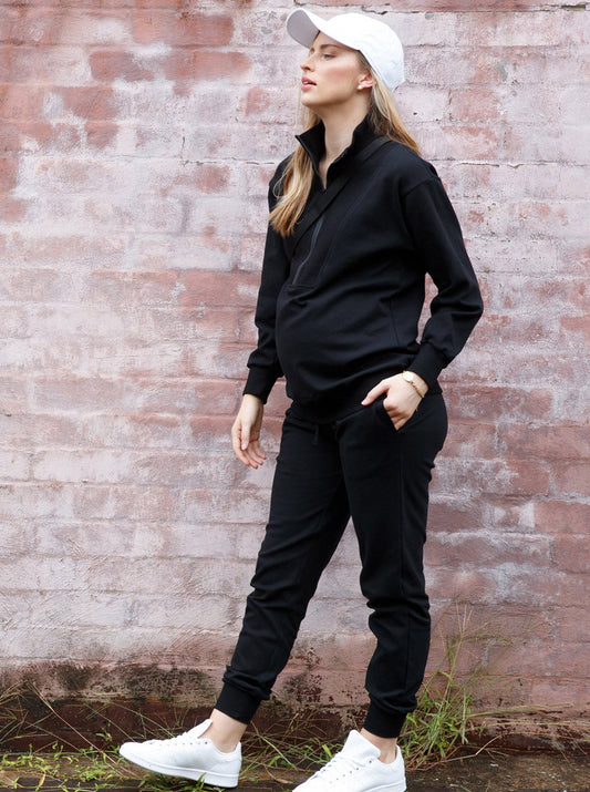 A woman in Calla navy black maternity tracksuit set, main (6647093657703)